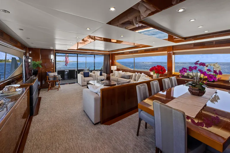 Oasis Yacht Photos Pics Luxurious interior of 2010 Princess 95 Motor Yacht with elegant dining and seating areas.