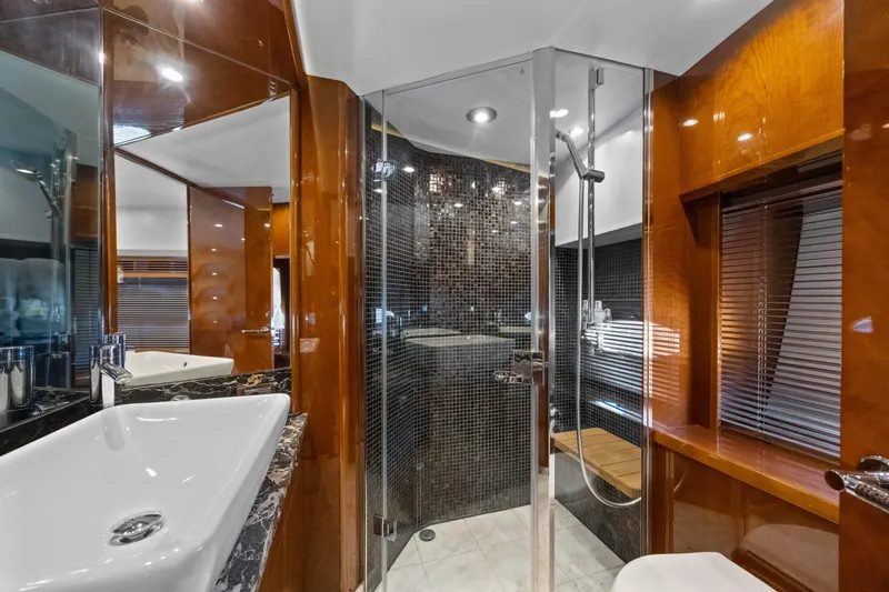 Oasis Yacht Photos Pics Luxurious bathroom on 2010 Princess 95 Motor Yacht with modern fixtures and elegant design.