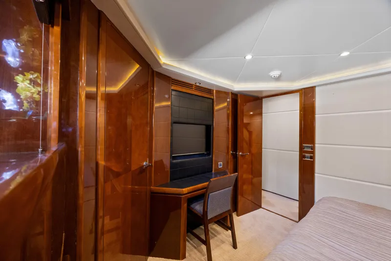 Oasis Yacht Photos Pics Luxurious interior of 2010 Princess 95 Motor Yacht with elegant wood finishes and modern design.
