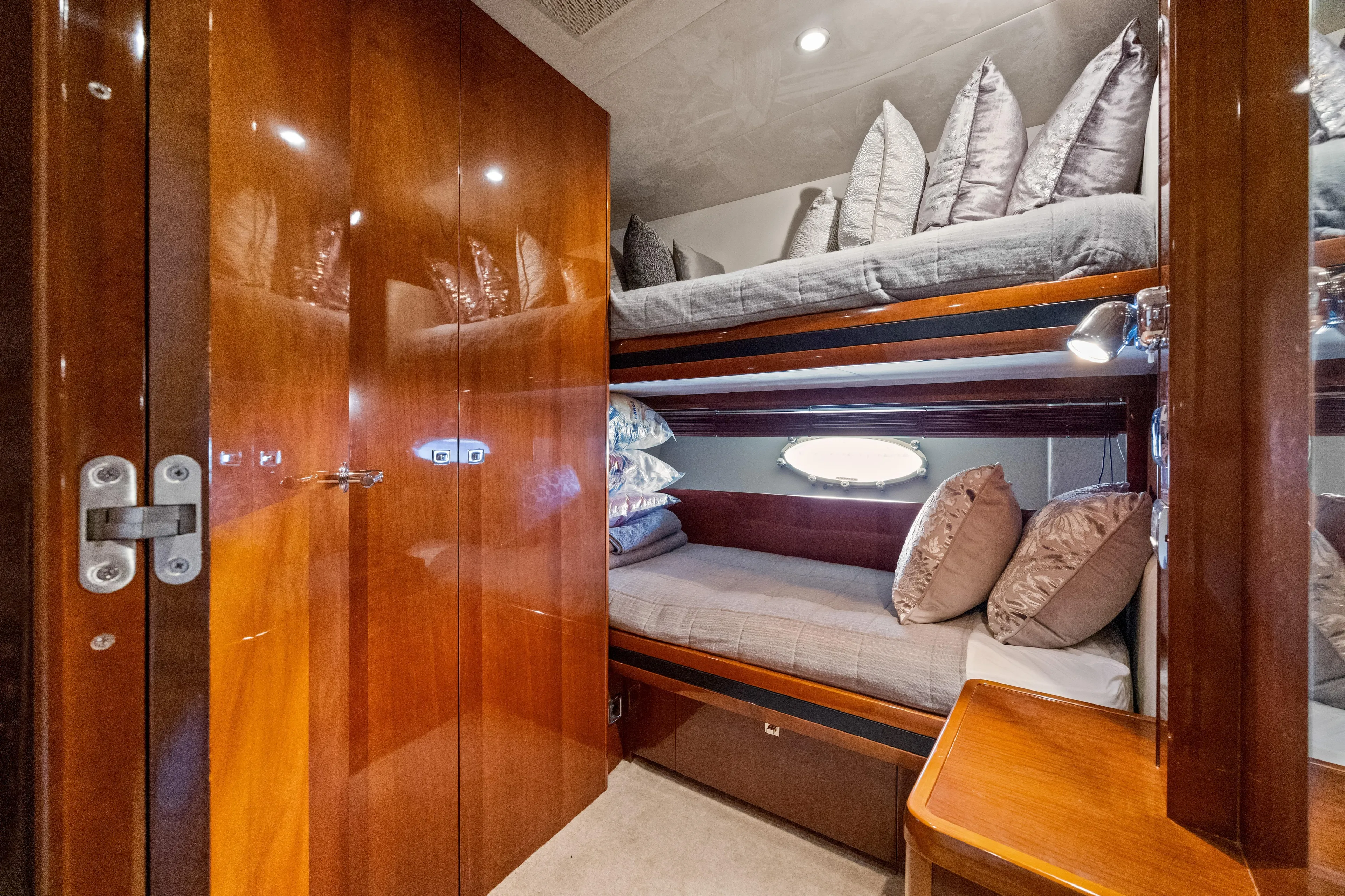 Oasis Yacht Photos Pics Luxurious cabin with bunk beds on a 2010 Princess 95 Motor Yacht.