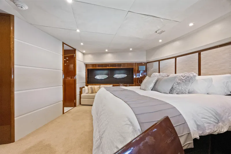 Oasis Yacht Photos Pics Luxurious bedroom interior of 2010 Princess 95 Motor Yacht with elegant furnishings.