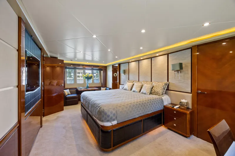 Oasis Yacht Photos Pics Luxurious bedroom interior of 2010 Princess 95 Motor Yacht with elegant furnishings.