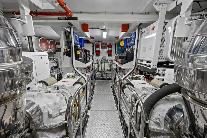 Oasis Yacht Photos Pics Engine room of a 2010 Princess 95 Motor Yacht, showcasing machinery and equipment.