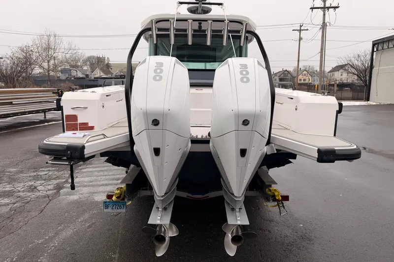  Yacht Photos Pics 2021 Axopar 37 XC Cross Cabin with dual 300 horsepower engines, rear view.