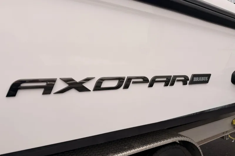  Yacht Photos Pics 2021 Axopar 37 XC Cross Cabin boat logo on white hull.