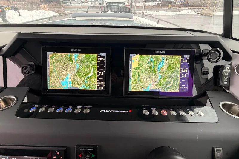  Yacht Photos Pics 2021 Axopar 37 XC Cross Cabin dashboard with dual Simrad navigation screens.