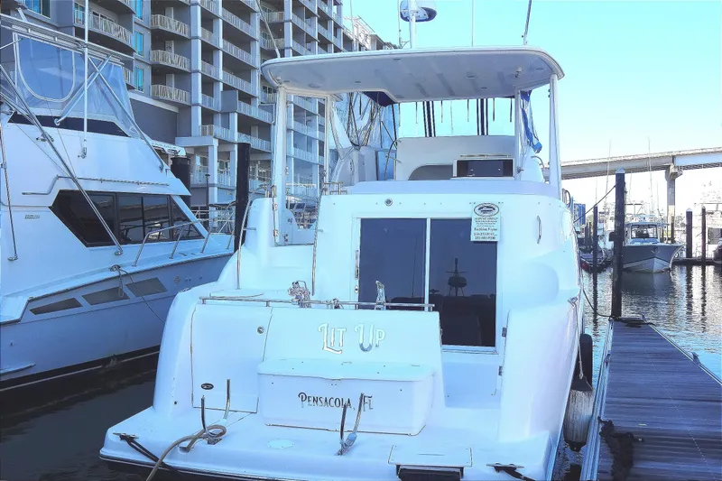 Lit Up Yacht Photos Pics 2007 Meridian 459 yacht docked at marina office in Orange Beach, Alabama. Lit Up home port is Pensacola, Florida. Lit Up has been moved for your convenience and viewing pleasure