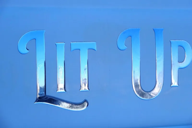 Lit Up Yacht Photos Pics "Lit Up" text on blue Meridian 459, 2007 model.