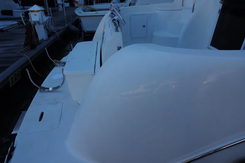 Lit Up Yacht Photos Pics 2007 Meridian 459 yacht deck with seating and dock view.