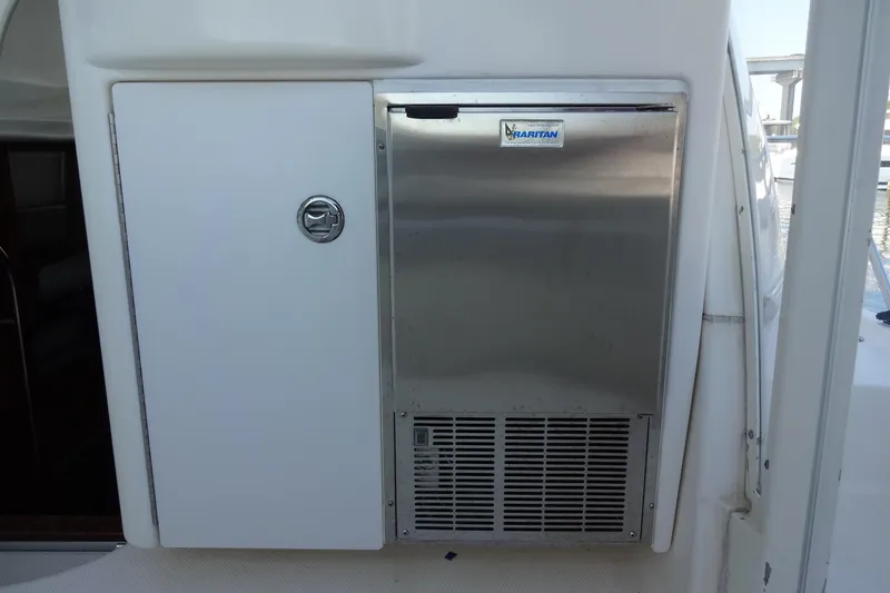 Lit Up Yacht Photos Pics 2007 Meridian 459 yacht with stainless steel Raritan ice maker on deck.