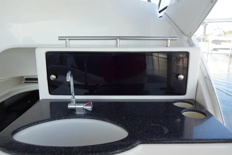 Lit Up Yacht Photos Pics 2007 Meridian 459 yacht interior with sleek sink and countertop design.