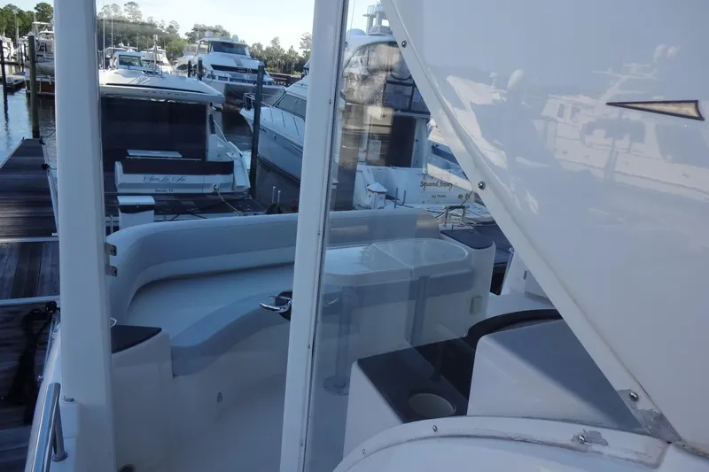 Lit Up Yacht Photos Pics 2007 Meridian 459 yacht docked at marina, featuring spacious deck and seating area.