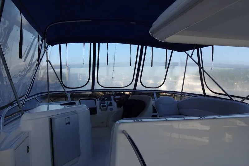 Lit Up Yacht Photos Pics Interior view of a 2007 Meridian 459 yacht cockpit with seating and controls.