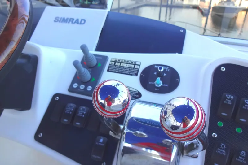 Lit Up Yacht Photos Pics Control panel of a 2007 Meridian 459 yacht with Simrad navigation system.