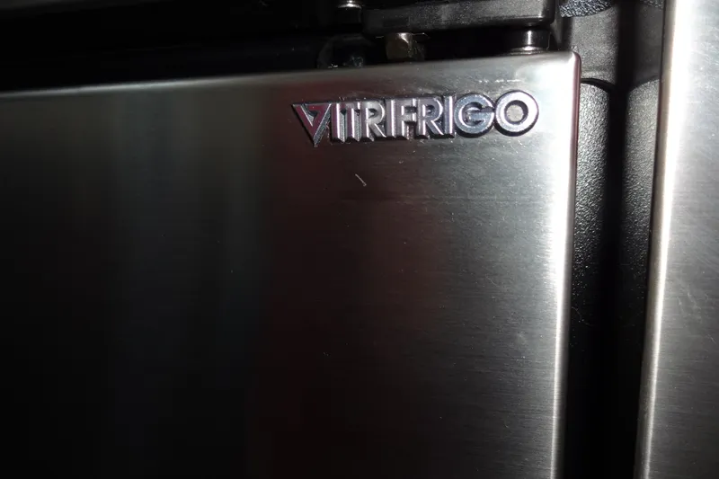 Lit Up Yacht Photos Pics Close-up of Vitrifrigo logo on stainless steel appliance, Meridian 459, 2007 model.