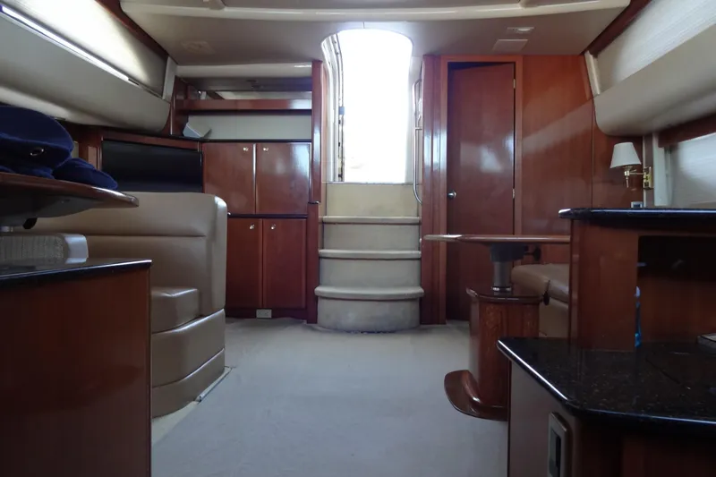 Lit Up Yacht Photos Pics Luxurious interior of a 2007 Meridian 459 yacht with elegant wood finishes.