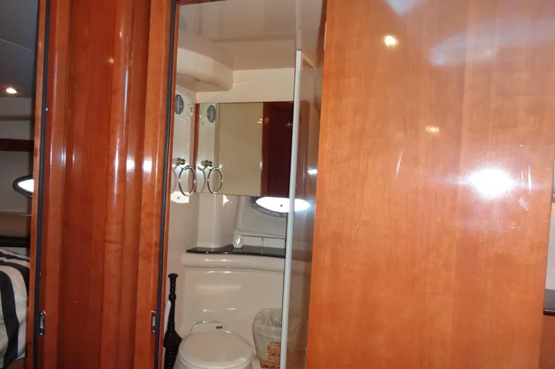 Lit Up Yacht Photos Pics Luxurious bathroom interior of 2007 Meridian 459 yacht with wooden finishes.