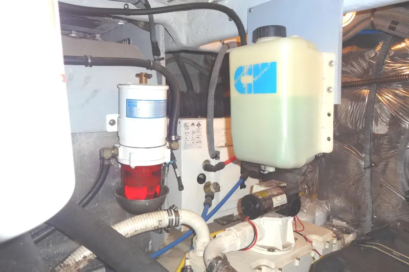 Lit Up Yacht Photos Pics Engine compartment of 2007 Meridian 459 yacht with fuel filter and coolant reservoir.