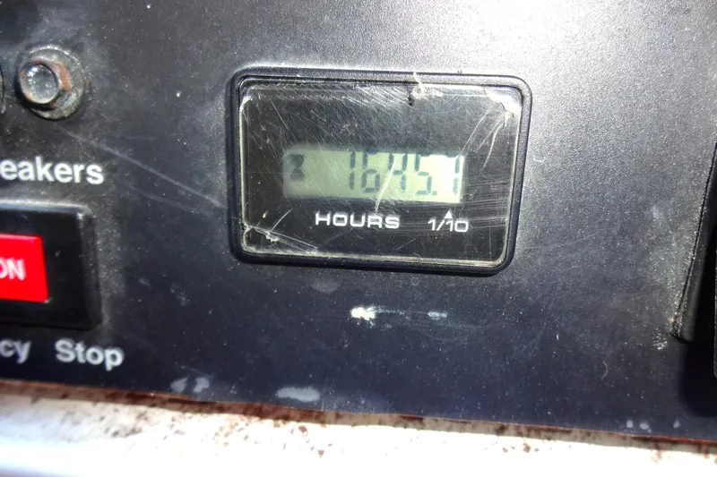 Lit Up Yacht Photos Pics Hour meter showing 1674.1 hours on a 2007 Meridian 459 generator.
