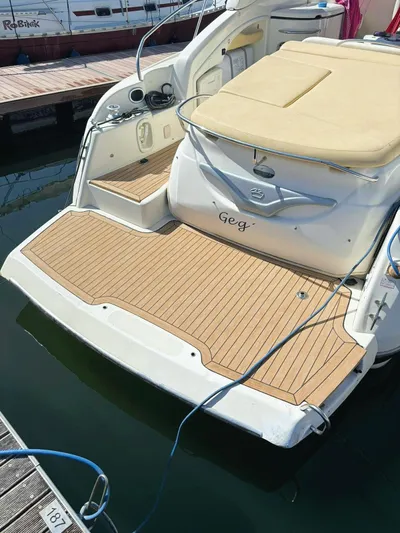  Yacht Photos Pics 2009 Cranchi Endurance 41 yacht with teak deck at marina.