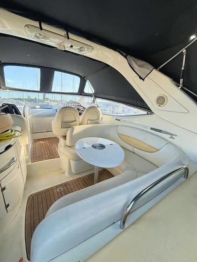  Yacht Photos Pics 2009 Cranchi Endurance 41 yacht interior with seating and table.