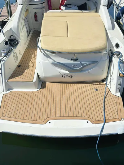  Yacht Photos Pics 2009 Cranchi Endurance 41 yacht with teak deck and cushioned seating.