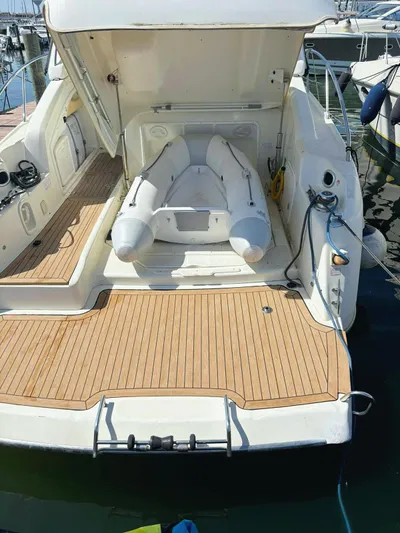  Yacht Photos Pics 2009 Cranchi Endurance 41 yacht with open deck and inflatable tender.