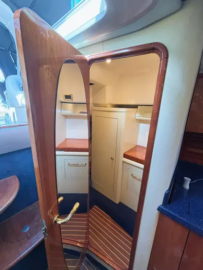  Yacht Photos Pics Interior of 2009 Cranchi Endurance 41 yacht with wooden cabinetry and modern design.