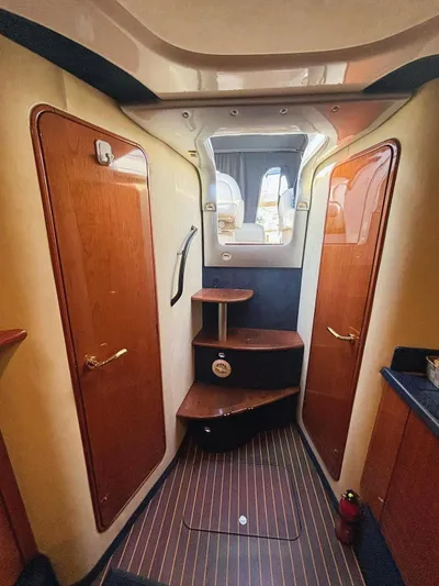  Yacht Photos Pics Interior of 2009 Cranchi Endurance 41 yacht with wooden doors and steps.