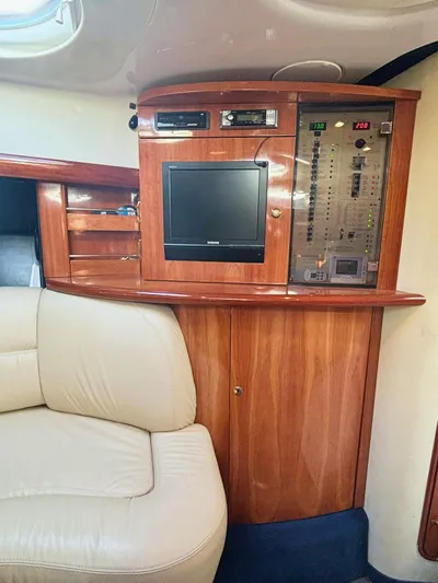  Yacht Photos Pics 2009 Cranchi Endurance 41 interior with control panel and TV.