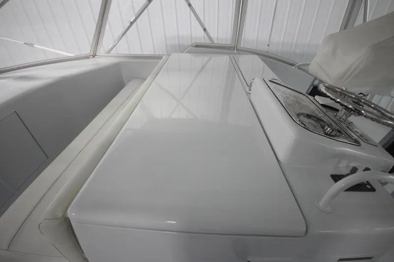 Rollwind Yacht Photos Pics Interior view of 2001 Hatteras 55 Convertible yacht helm station.