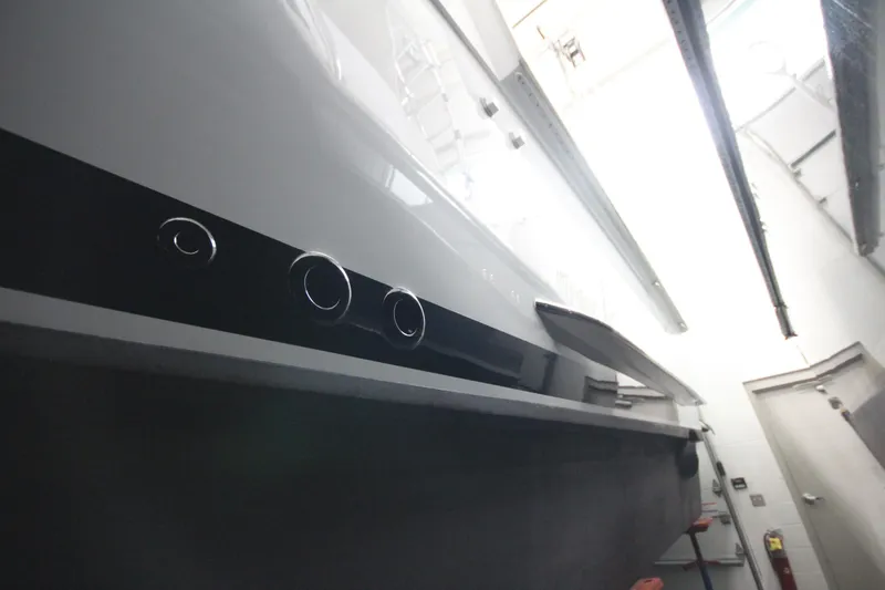 Rollwind Yacht Photos Pics 2001 Hatteras 55 Convertible yacht in indoor storage facility.