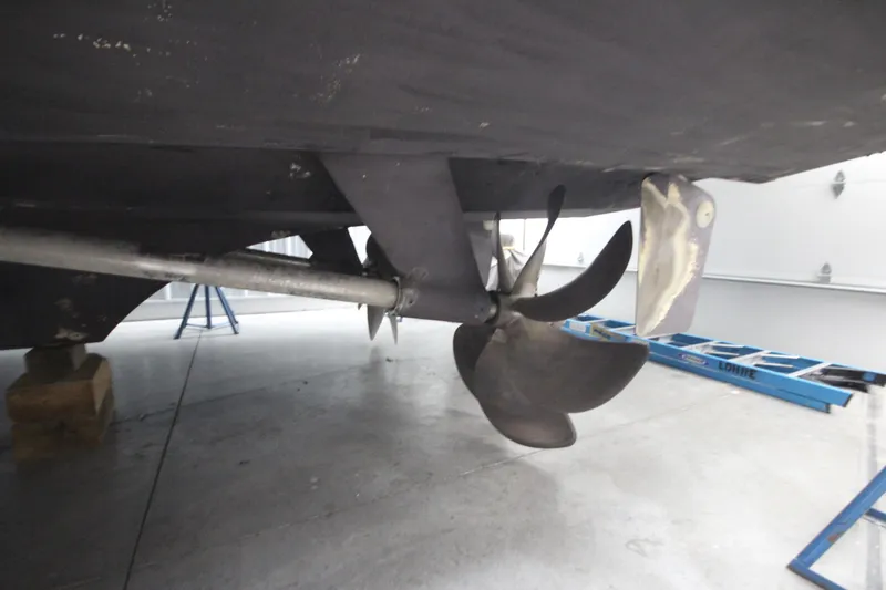 Rollwind Yacht Photos Pics Propeller of 2001 Hatteras 55 Convertible yacht in dry dock.