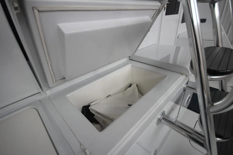 Rollwind Yacht Photos Pics Open storage compartment on 2001 Hatteras 55 Convertible yacht.