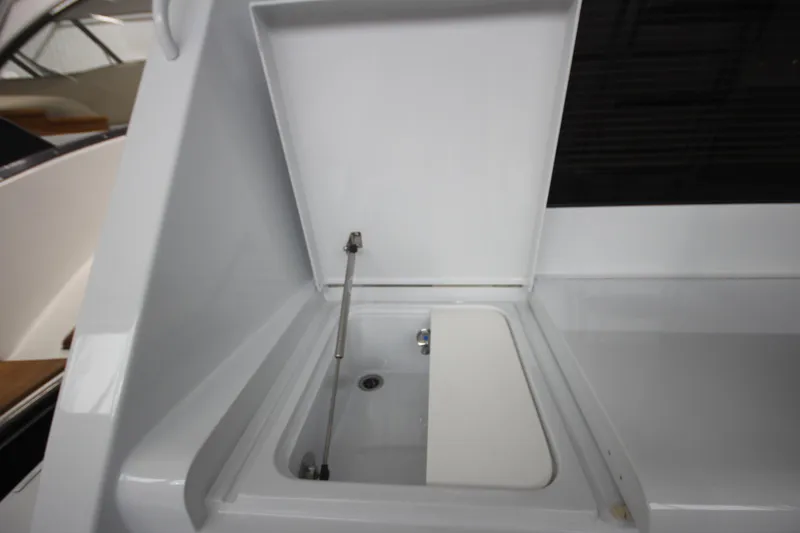 Rollwind Yacht Photos Pics Open storage compartment on 2001 Hatteras 55 Convertible yacht.