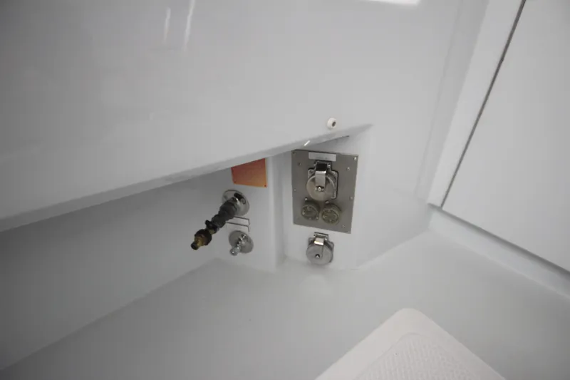 Rollwind Yacht Photos Pics Hatteras 55 Convertible 2001 yacht interior detail with utility connections.