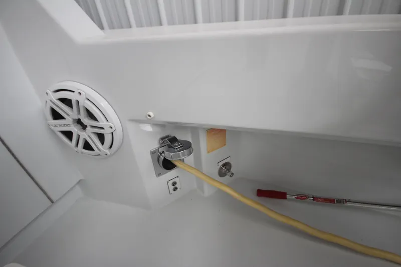 Rollwind Yacht Photos Pics Electrical outlet and speaker on 2001 Hatteras 55 Convertible yacht.