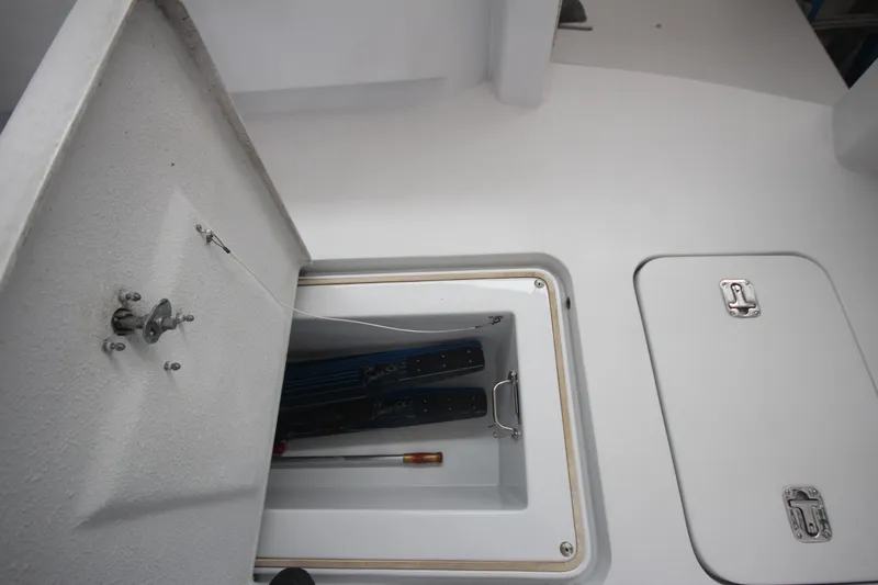 Rollwind Yacht Photos Pics Open storage compartment on 2001 Hatteras 55 Convertible boat deck.