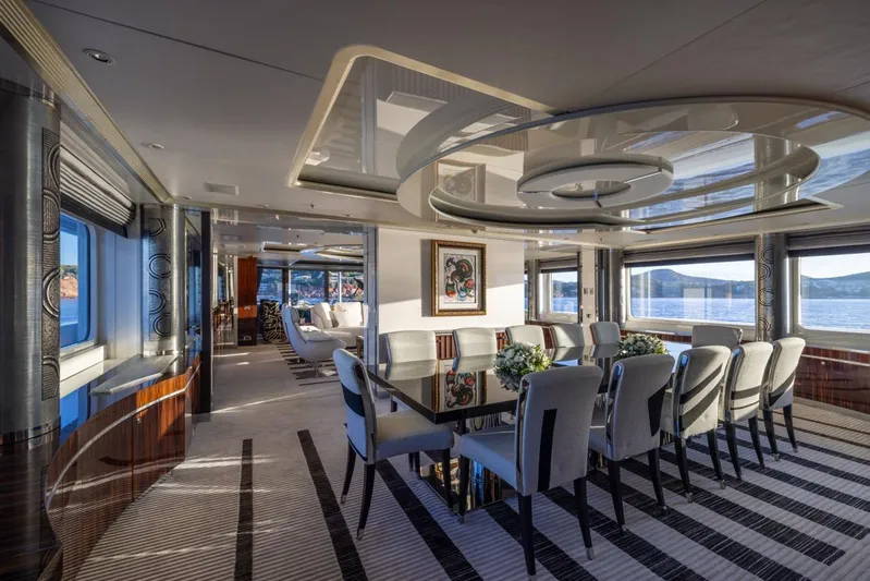 Alfa G Yacht Photos Pics Luxurious dining area on a 2004 Oceanco 60-meter yacht with elegant decor and panoramic views.