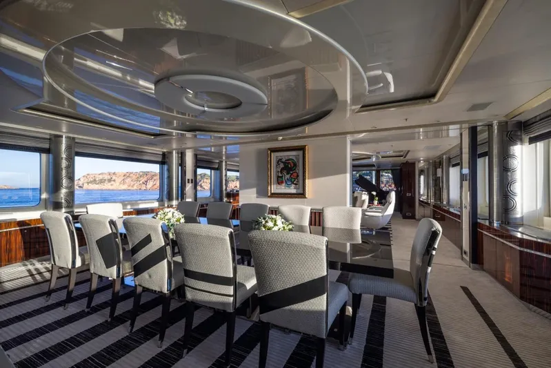 Alfa G Yacht Photos Pics Luxurious dining area on a 2004 Oceanco 60-meter yacht with elegant decor and ocean views.
