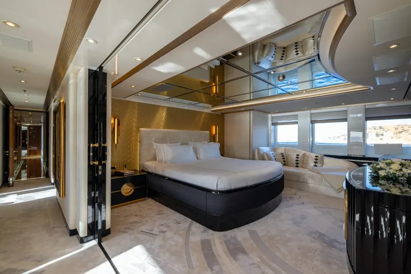 Alfa G Yacht Photos Pics Luxurious bedroom interior on a 2004 Oceanco 60-meter yacht, featuring elegant design and modern amenities.