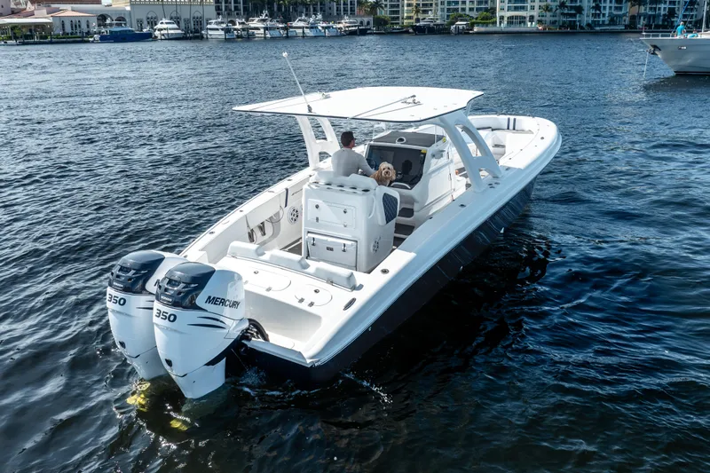  Yacht Photos Pics 2020 Midnight Express 34 Open boat with twin Mercury 350 engines on the water.