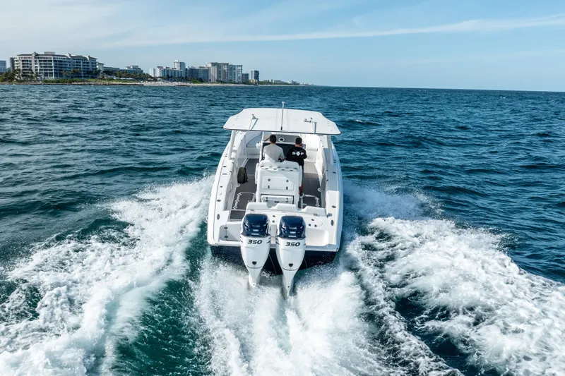  Yacht Photos Pics 2020 Midnight Express 34 Open boat cruising on the ocean.