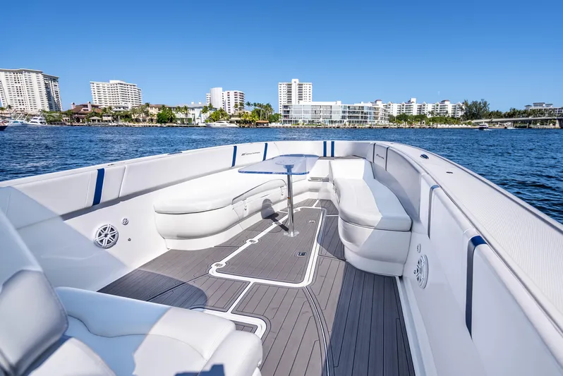  Yacht Photos Pics 2020 Midnight Express 34 Open boat with luxurious seating on a sunny day.