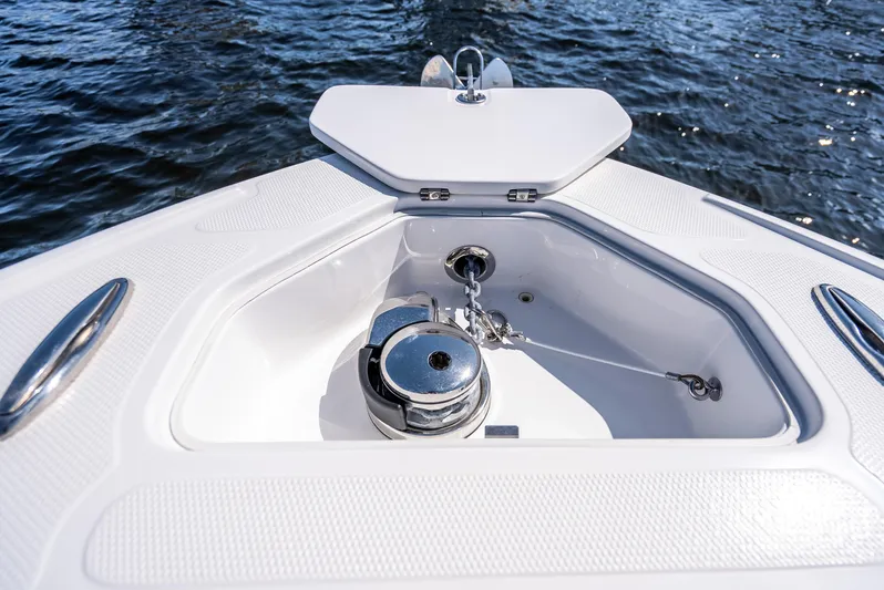 Yacht Photos Pics 2020 Midnight Express 34 Open boat anchor compartment on water.