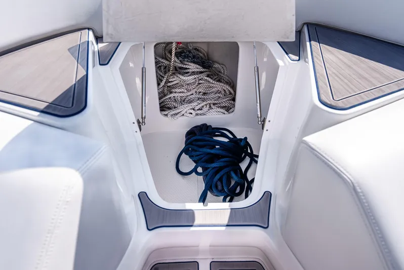  Yacht Photos Pics Storage compartment with ropes on a 2020 Midnight Express 34 Open boat.