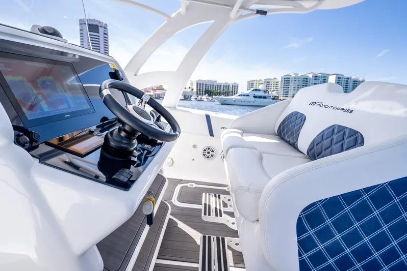  Yacht Photos Pics 2020 Midnight Express 34 Open boat interior with modern helm and seating.