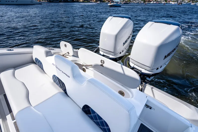  Yacht Photos Pics 2020 Midnight Express 34 Open boat with twin Mercury engines on water.