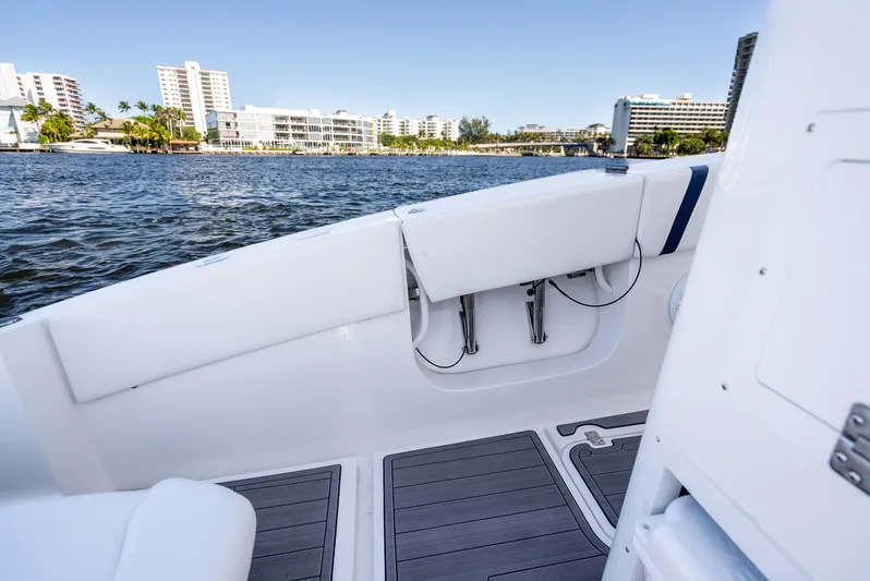  Yacht Photos Pics 2020 Midnight Express 34 Open boat interior with waterfront cityscape.