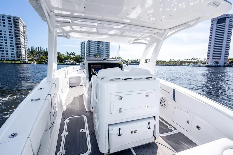 Yacht Photos Pics 2020 Midnight Express 34 Open boat interior with waterfront cityscape.